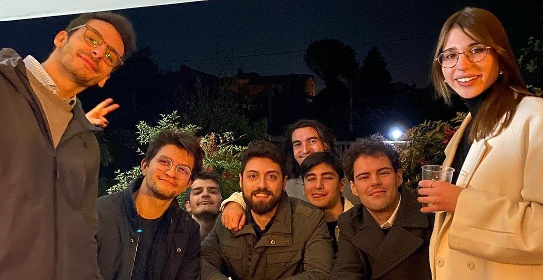 SIUMMM The owner of this website with his girlfriend and some of his best friends, posing for a picture together in a balcony.